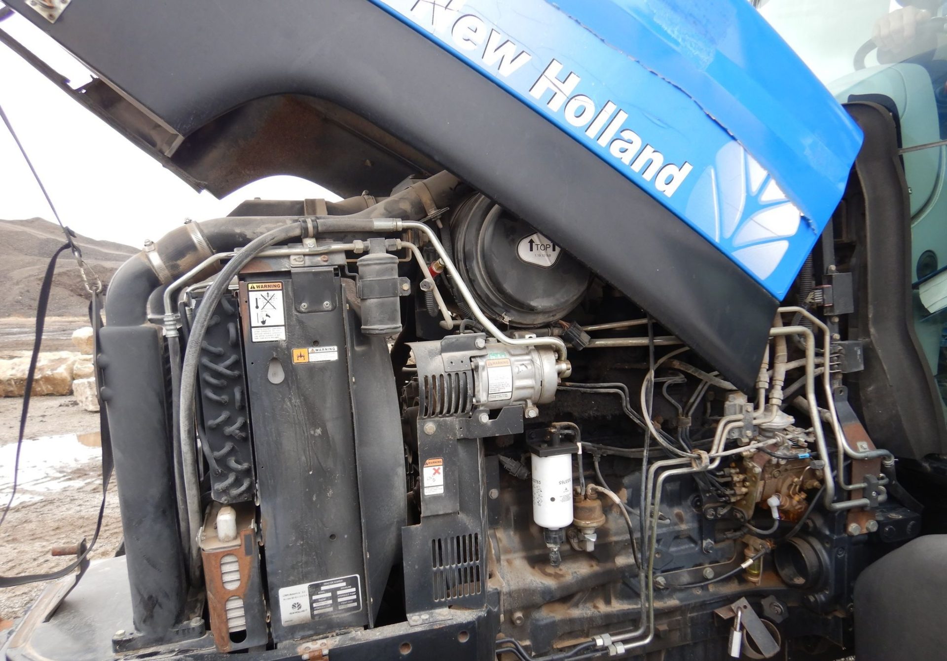 2009 New Holland T6030 - photo 1