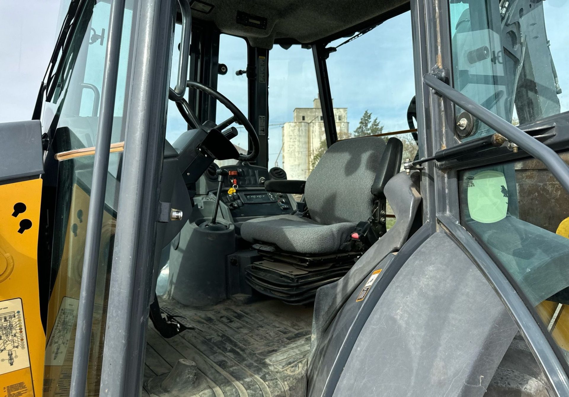 2010 John Deere 310J - photo 1